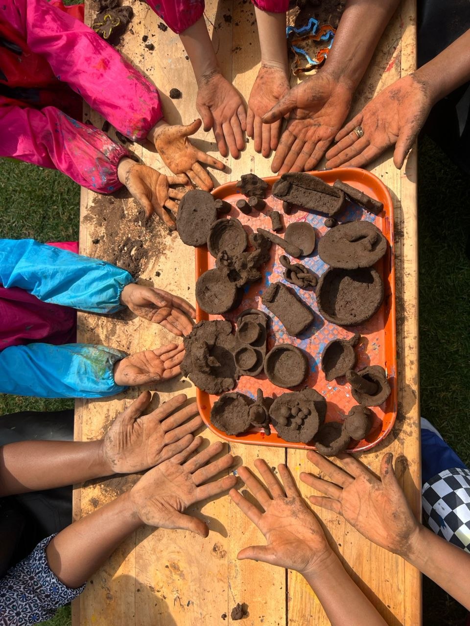 Children's hands with clay art projects